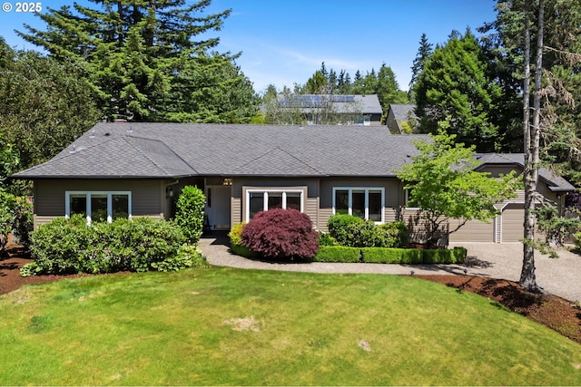 11315 NW Reeves St, Portland, OR 97229 - view of front of property featuring a front yard, asphalt driveway, and roof with shingles