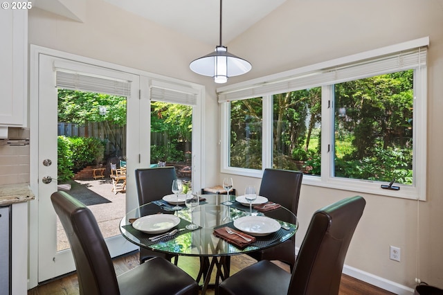 11315 NW Reeves St, Portland, OR 97229 - dining room with healthy amount of natural light, dark wood-style flooring, and baseboards
