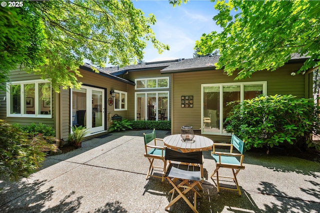 11315 NW Reeves St, Portland, OR 97229 - back of property featuring a patio area and outdoor dining space