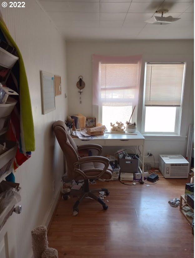 office area with wood-type flooring