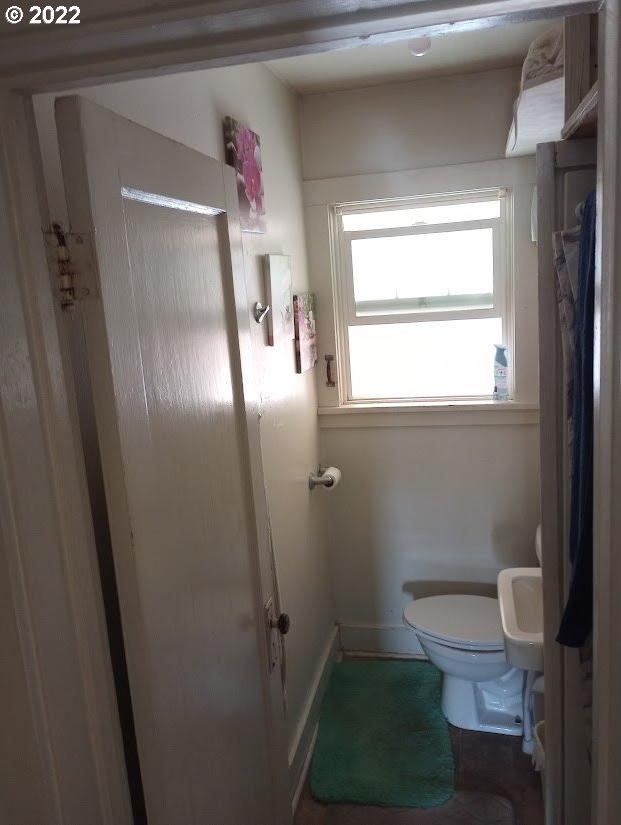 bathroom featuring toilet