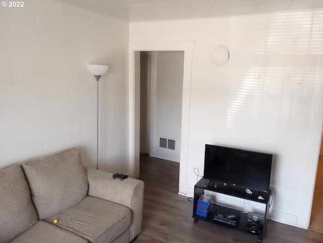 living room featuring dark hardwood / wood-style floors