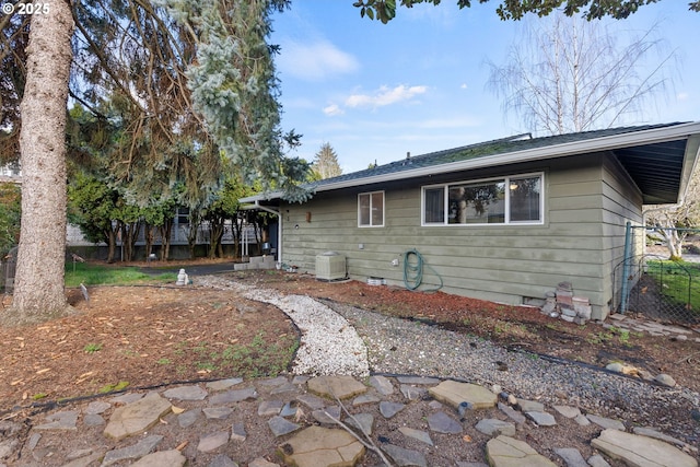 exterior space with crawl space and central air condition unit