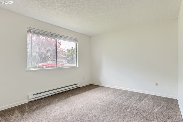 carpeted empty room featuring baseboards, a baseboard radiator, and a textured ceiling