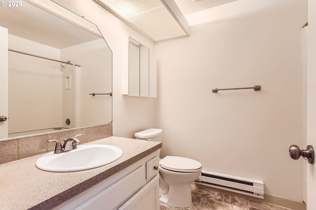 full bath with vanity, a shower, toilet, a baseboard heating unit, and stone finish flooring