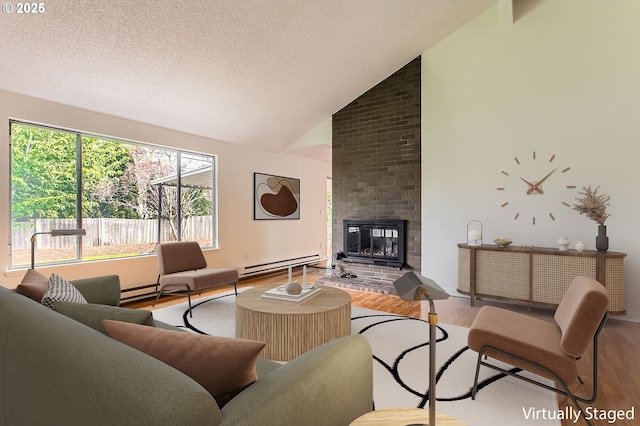 living room with a fireplace, baseboard heating, wood finished floors, and lofted ceiling
