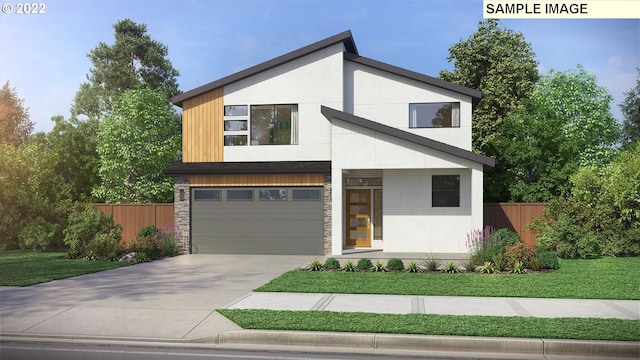 contemporary home featuring a front lawn and a garage