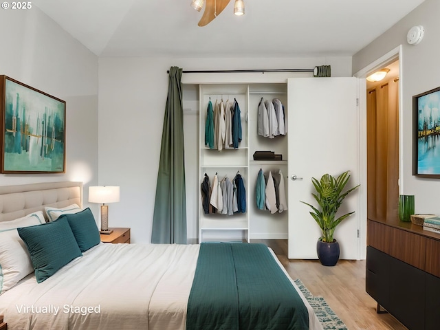 47 Eagle Crest Dr Unit 22, Lake Oswego, OR 97035 - bedroom with a closet and wood finished floors