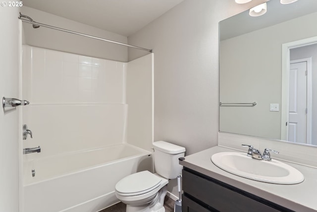 full bath featuring shower / bathing tub combination, vanity, and toilet