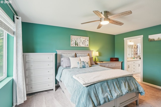 2570 SE Kane Ave, Gresham, OR 97080 - bedroom featuring light colored carpet, ensuite bathroom, and ceiling fan