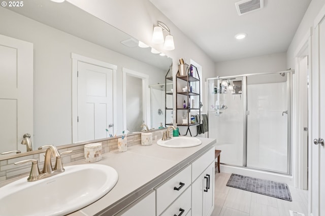 2570 SE Kane Ave, Gresham, OR 97080 - bathroom with a shower stall, double vanity, and recessed lighting