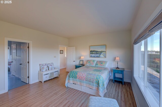 4830 Butterfly Ln, Gearhart, OR 97138 - bedroom featuring wood finished floors and baseboards