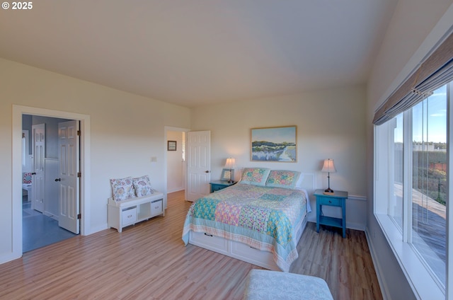 4830 Butterfly Ln, Gearhart, OR 97138 - bedroom featuring wood finished floors and baseboards