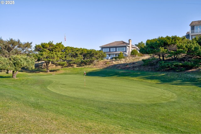 4830 Butterfly Ln, Gearhart, OR 97138 - surrounding community featuring golf course view, a lawn, and a putting green