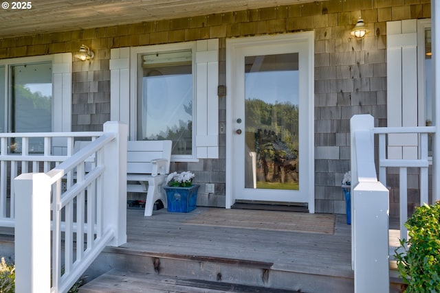 4830 Butterfly Ln, Gearhart, OR 97138 - doorway to property with a porch