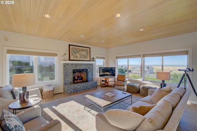 4830 Butterfly Ln, Gearhart, OR 97138 - living room featuring wood finished floors, recessed lighting, a fireplace, healthy amount of natural light, and wood ceiling