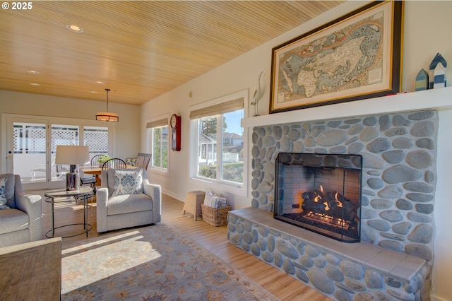 4830 Butterfly Ln, Gearhart, OR 97138 - living room featuring wood finished floors, a fireplace, and wood ceiling