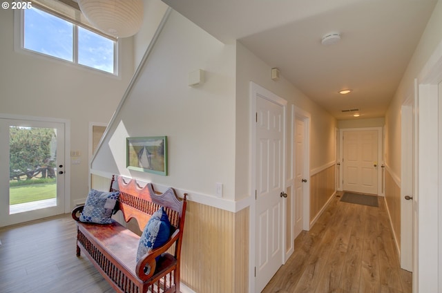 4830 Butterfly Ln, Gearhart, OR 97138 - corridor with light wood-type flooring and healthy amount of natural light