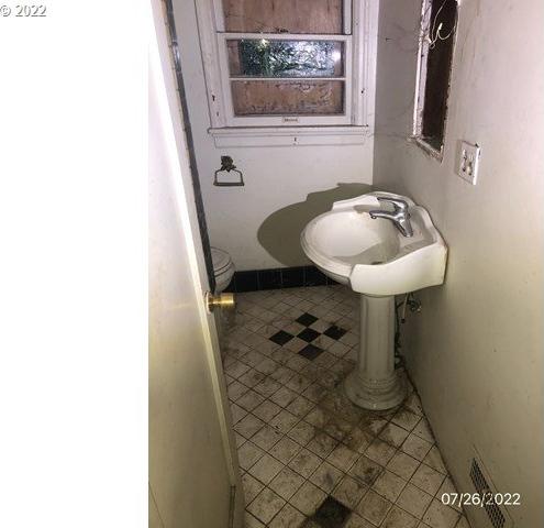 bathroom with sink and toilet