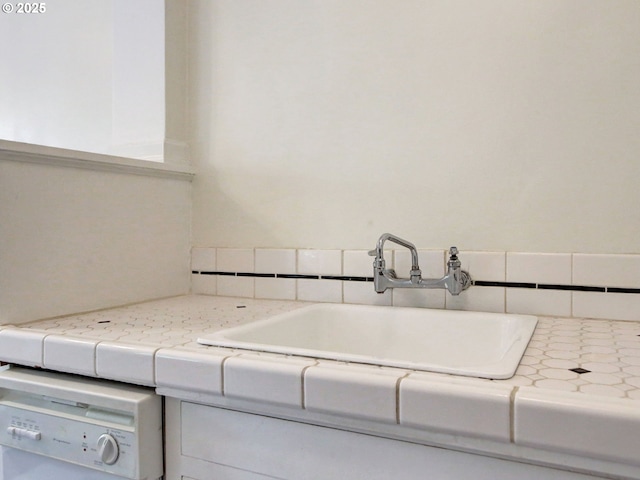 20 NW 16th Ave Unit 211, Portland, OR 97209 - bathroom with a sink and backsplash