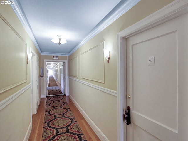20 NW 16th Ave Unit 211, Portland, OR 97209 - doorway to outside featuring light wood finished floors, ornamental molding, and baseboards