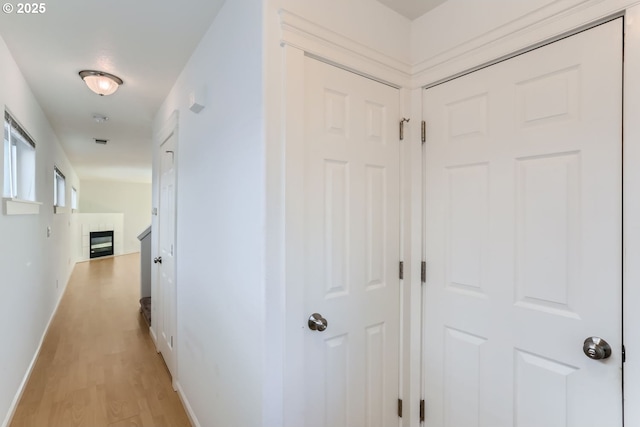 hall featuring light hardwood / wood-style flooring