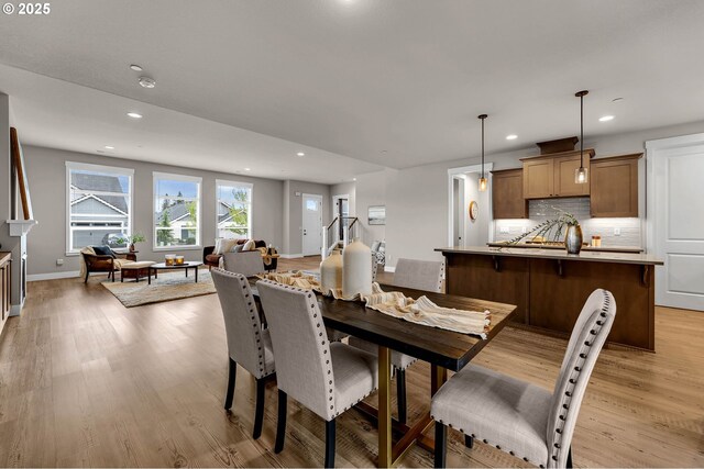 5719 N 87th Ave, Camas, WA 98607 - dining room featuring light wood finished floors, recessed lighting, and baseboards