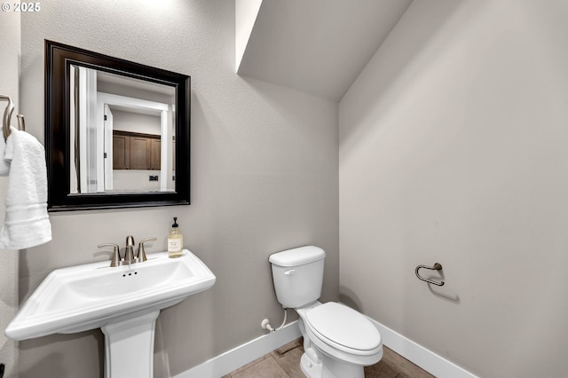 5719 N 87th Ave, Camas, WA 98607 - bathroom with toilet, baseboards, and tile patterned flooring
