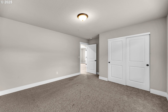 5719 N 87th Ave, Camas, WA 98607 - unfurnished bedroom with carpet flooring, baseboards, and a closet