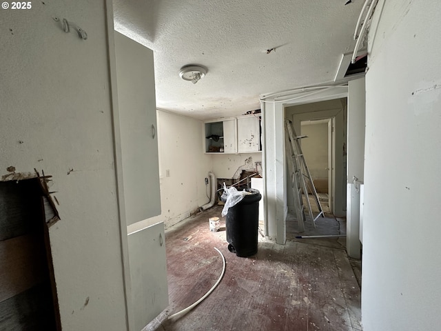 214 W Broadway St, Goldendale, WA 98620 - corridor featuring a textured ceiling