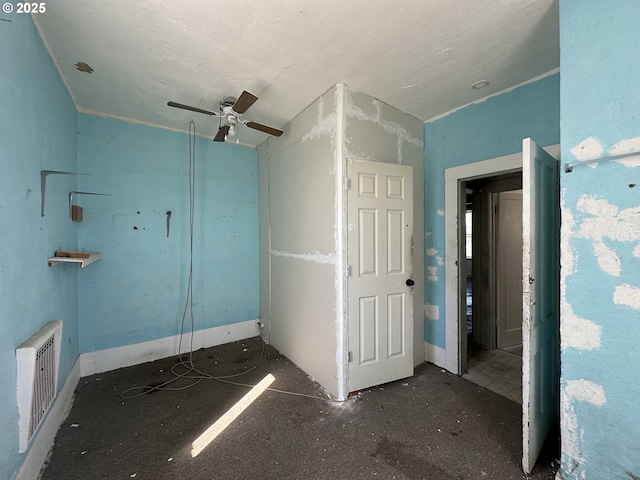 214 W Broadway St, Goldendale, WA 98620 - unfurnished bedroom with baseboards, a ceiling fan, and visible vents