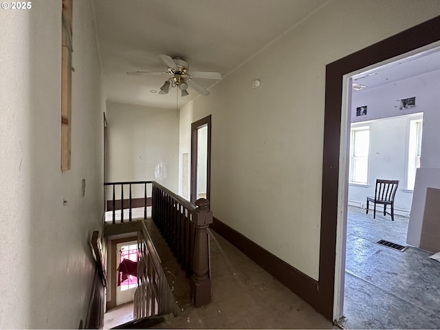 214 W Broadway St, Goldendale, WA 98620 - hallway featuring visible vents and an upstairs landing