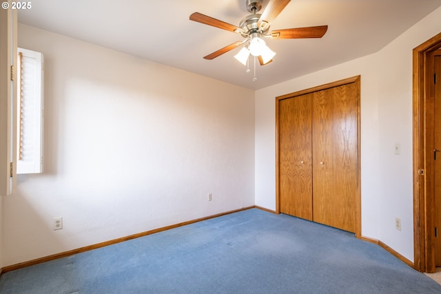 unfurnished bedroom featuring a closet, ceiling fan, and light colored carpet