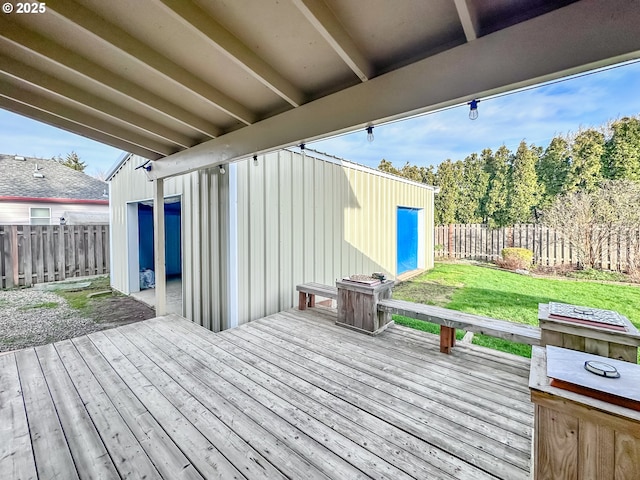 deck featuring a lawn