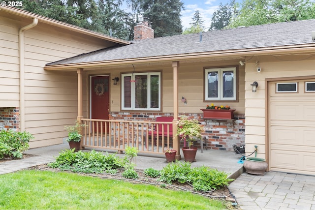 property entrance with a porch, a shingled roof, and a chimney