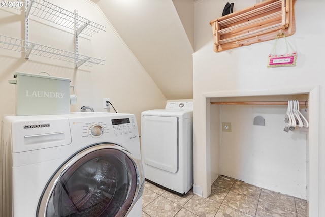 laundry room with laundry area and washer and clothes dryer