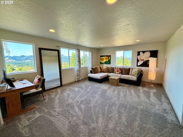 6189 Forest Ridge Dr, Springfield, OR 97478 - carpeted living area featuring recessed lighting, a textured ceiling, and a desk