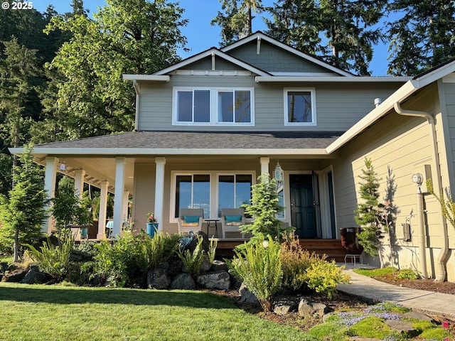 6189 Forest Ridge Dr, Springfield, OR 97478 - view of front facade featuring covered porch, a front lawn, and a shingled roof