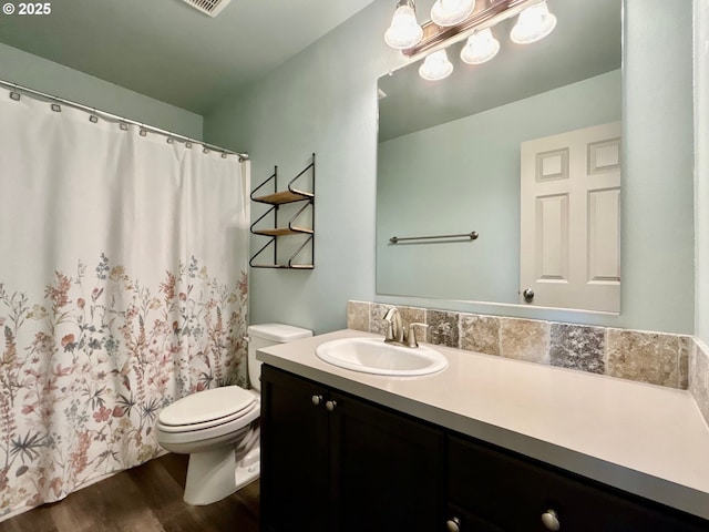 6189 Forest Ridge Dr, Springfield, OR 97478 - full bathroom with wood finished floors, vanity, and a shower with curtain