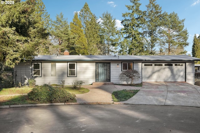 ranch-style home with a garage