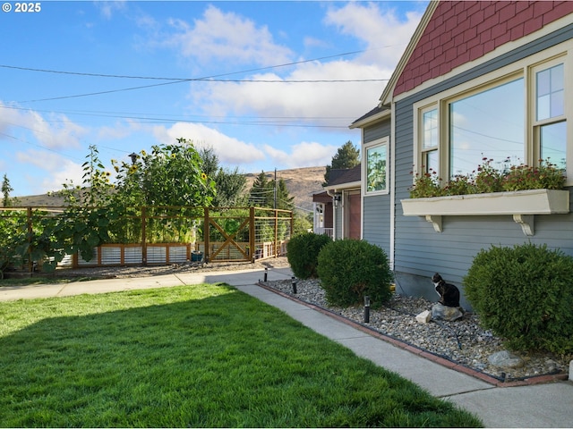 view of yard featuring fence