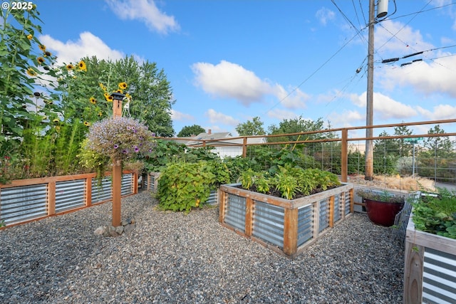 view of yard featuring a garden and fence