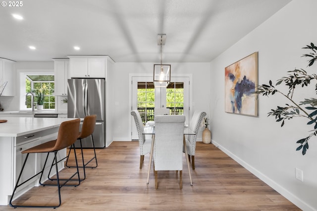 18478 Rose Ct, West Linn, OR 97068 - dining space with healthy amount of natural light, light wood-type flooring, and recessed lighting