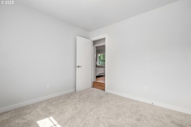 18478 Rose Ct, West Linn, OR 97068 - empty room featuring carpet floors and baseboards