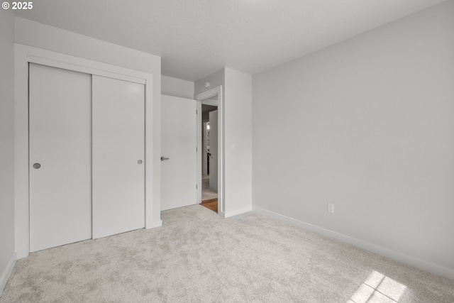 18478 Rose Ct, West Linn, OR 97068 - unfurnished bedroom with carpet flooring and a closet