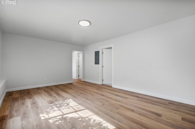 18478 Rose Ct, West Linn, OR 97068 - unfurnished room with electric panel and wood finished floors
