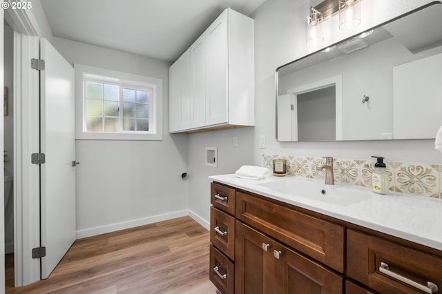 18478 Rose Ct, West Linn, OR 97068 - washroom featuring hookup for a washing machine, light wood finished floors, and electric dryer hookup