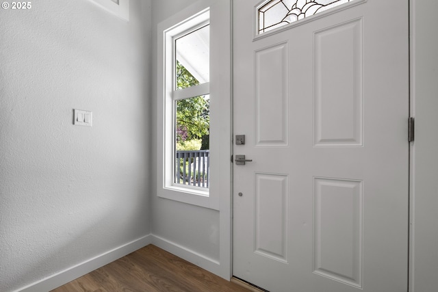 18478 Rose Ct, West Linn, OR 97068 - foyer with baseboards and dark wood-style flooring