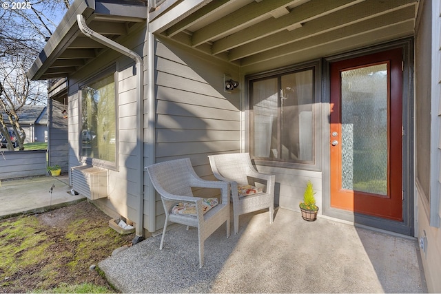 property entrance featuring a patio