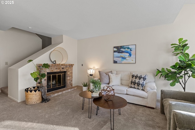 carpeted living room with a brick fireplace